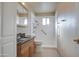 Bathroom with granite vanity, accessible shower and tile floors at 1340 N Oregon St, Chandler, AZ 85225