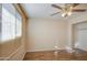 Bedroom features wood-look flooring, a window and a ceiling fan at 1340 N Oregon St, Chandler, AZ 85225