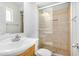 Modern bathroom featuring a walk-in shower with tile surround, updated vanity, and neutral finishes at 14008 N 61St Ave, Glendale, AZ 85306