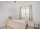 Sunny bedroom with a comfortable bed, soft window light, and simple, stylish decor at 14008 N 61St Ave, Glendale, AZ 85306