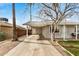 Home with covered carport and mature trees at 14008 N 61St Ave, Glendale, AZ 85306