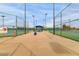 View of a tennis court with shade cover for breaks at 14008 N 61St Ave, Glendale, AZ 85306