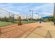 Community tennis court with covered seating area at 14008 N 61St Ave, Glendale, AZ 85306