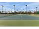 A scenic shot of outdoor tennis courts offers a picturesque setting for tennis enthusiasts at 14008 N 61St Ave, Glendale, AZ 85306