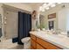 Bright bathroom with a shower-tub combo, stylish vanity, and decorative accents at 14910 N Kings Way # 101, Fountain Hills, AZ 85268