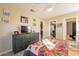 Comfortable bedroom featuring a ceiling fan, a modern dresser and ensuite bathroom and walk-in closet at 14910 N Kings Way # 101, Fountain Hills, AZ 85268