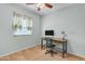 Bedroom with a desk and a rolling desk chair at 151 N 116Th Dr, Avondale, AZ 85323