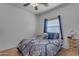 Cozy bedroom with blue accents, carpet, and a window for natural light at 151 N 116Th Dr, Avondale, AZ 85323