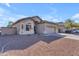 Charming single-story home with a well-maintained gravel front yard and attached garage at 151 N 116Th Dr, Avondale, AZ 85323