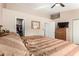 This bedroom showcases a calming color palette, vaulted ceiling, and a door to the closet at 1600 N Saba St # 191, Chandler, AZ 85225