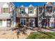 Two-story townhome featuring a well maintained yard, brick facade, and easy-to-access front entrance at 1600 N Saba St # 191, Chandler, AZ 85225