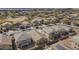 Scenic aerial view of a suburban neighborhood featuring well-maintained homes and landscaping at 16102 W Miami St, Goodyear, AZ 85338