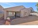 Spacious backyard with covered patio, perfect for entertaining and relaxation at 16102 W Miami St, Goodyear, AZ 85338