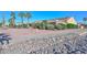 Beautiful single story home with desert landscaping and a view of the community at 16409 W Alvarado Dr, Goodyear, AZ 85395