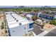 Aerial view showcasing modern townhomes with a community park in a vibrant neighborhood at 1642 E Monte Vista Rd # 9, Phoenix, AZ 85006