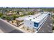 Modern home with white roof, blue accents, and a cityscape in the background at 1642 E Monte Vista Rd # 9, Phoenix, AZ 85006