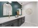 Elegant bathroom featuring double sinks, gold fixtures, and marble tile floors at 1642 E Monte Vista Rd # 9, Phoenix, AZ 85006