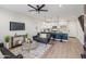 Bright and airy living room featuring an open-concept design with a modern kitchen and stylish furnishings at 1642 E Monte Vista Rd # 9, Phoenix, AZ 85006