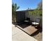 Cozy patio with a privacy screen, comfortable seating, and a peaceful outdoor setting at 1642 E Monte Vista Rd # 9, Phoenix, AZ 85006