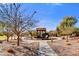 View of the community playground, featuring swings, play structure, and shaded picnic area at 17138 W Las Palmaritas Dr, Waddell, AZ 85355