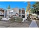 Charming condo complex featuring well-maintained landscaping and private balcony at 17211 N 35Th Ave, Phoenix, AZ 85053