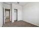 Bedroom with carpeting and a closet with sliding doors at 1768 W Storia Ave, Apache Junction, AZ 85120