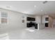 Spacious living room with dark kitchen and large windows providing ample natural light at 1768 W Storia Ave, Apache Junction, AZ 85120