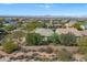 Scenic aerial view of a residential neighborhood, showcasing the home's location at 17963 E Silver Sage Ln, Rio Verde, AZ 85263