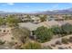 Beautiful aerial shot of a home in a vibrant community with stunning mountain views at 17963 E Silver Sage Ln, Rio Verde, AZ 85263