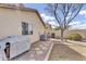 View of the backyard showcasing the exterior wall and some light landscaping at 1992 E Shetland Dr, San Tan Valley, AZ 85140