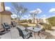 Backyard patio features a seating area for entertaining and relaxing outdoors at 1992 E Shetland Dr, San Tan Valley, AZ 85140