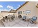 Backyard patio with an outdoor seating and an access to the house at 1992 E Shetland Dr, San Tan Valley, AZ 85140