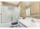 Bathroom featuring a shower with sliding glass doors and a vanity with a mirror at 238 N 62Nd St, Mesa, AZ 85205