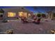 Inviting backyard features a cozy firepit and outdoor seating, perfect for entertaining or relaxing at 25609 N 54Th Ln, Phoenix, AZ 85083