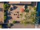 Overhead shot of brick paver patio with a fire pit, seating, and an umbrella at 25609 N 54Th Ln, Phoenix, AZ 85083