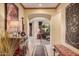 Warm entryway with decorative furnishings leading into the living area of the house at 25609 N 54Th Ln, Phoenix, AZ 85083