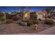 View of the front yard featuring professionally designed desert landscaping at 25609 N 54Th Ln, Phoenix, AZ 85083