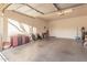 Spacious and clean garage, perfect for storage or a workshop, with ample room for parking at 25609 N 54Th Ln, Phoenix, AZ 85083