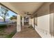 Relaxing covered patio with ceiling fan overlooking the backyard space at 2646 N Robin Ln, Mesa, AZ 85213