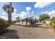 Spacious backyard with a gazebo, hot tub, and swimming pool offers outdoor enjoyment and relaxation at 26649 S Howard Dr, Sun Lakes, AZ 85248