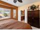 Sunlit main bedroom with an ensuite bathroom, closet, and relaxing ambiance at 27108 W Escuda Dr, Buckeye, AZ 85396