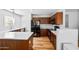 Stylish kitchen with white subway tile backsplash, stainless steel appliances, and wood cabinets at 28871 N Coal Ave, San Tan Valley, AZ 85143