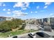 Scenic view of the neighborhood from a private balcony featuring green spaces and townhome community at 300 N Gila Springs Blvd # 141, Chandler, AZ 85226