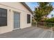 Covered patio with exterior access to a deck overlooking the backyard and neighborhood at 3034 N Ricardo --, Mesa, AZ 85215