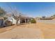 A backyard showcasing the rear exterior of the home and its outdoor space at 3129 W Pierce St, Phoenix, AZ 85009