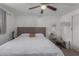 Spacious bedroom features a large bed, ceiling fan, and ample natural light at 3129 W Pierce St, Phoenix, AZ 85009