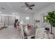 Well-lit dining area next to the kitchen has modern finishes and neutral colors at 3129 W Pierce St, Phoenix, AZ 85009