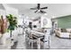 Open floor plan showcasing the dining area, kitchen, and living room, highlighting a seamless flow for entertaining at 3129 W Pierce St, Phoenix, AZ 85009