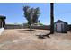 A spacious backyard with a privacy wall offers a blank canvas for landscaping and outdoor living at 3547 W Encanto Blvd, Phoenix, AZ 85009