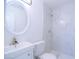 Modern bathroom featuring a sleek sink, toilet, and tiled shower at 3547 W Encanto Blvd, Phoenix, AZ 85009